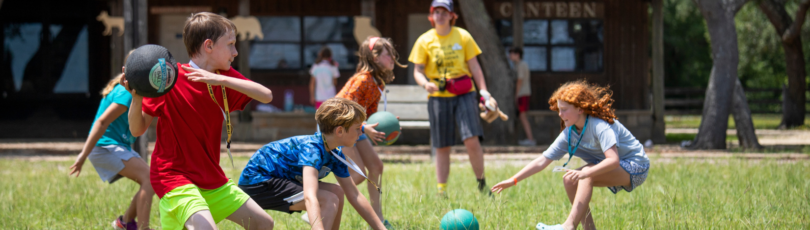 Photo of youth playing dodgeball at Camp Timpoochee