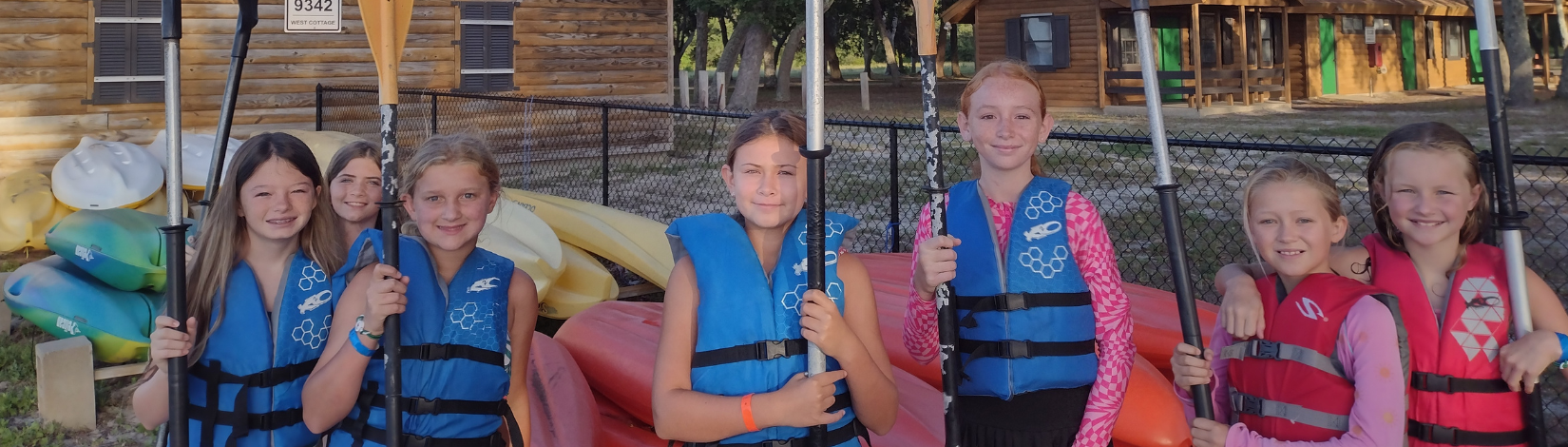 Photo of youth at camp timpoochee kayaking