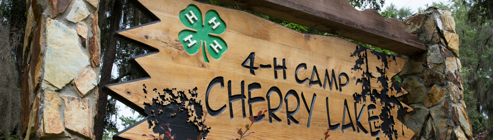 Banner image of Camp Cherry Lake welcome sign