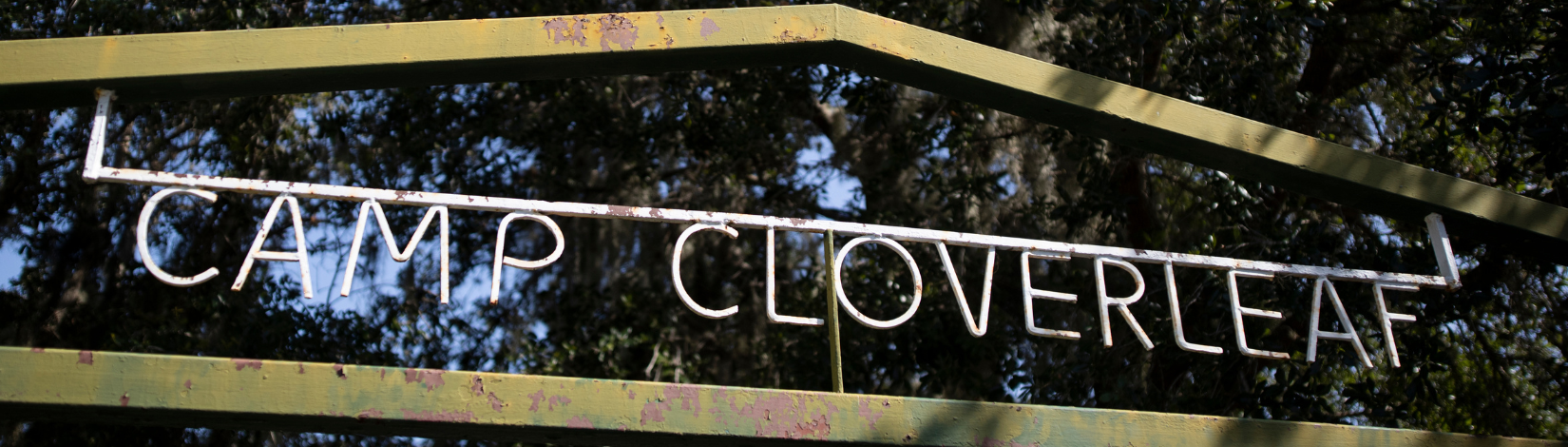 Banner image of Camp Cloverleaf welcome sign