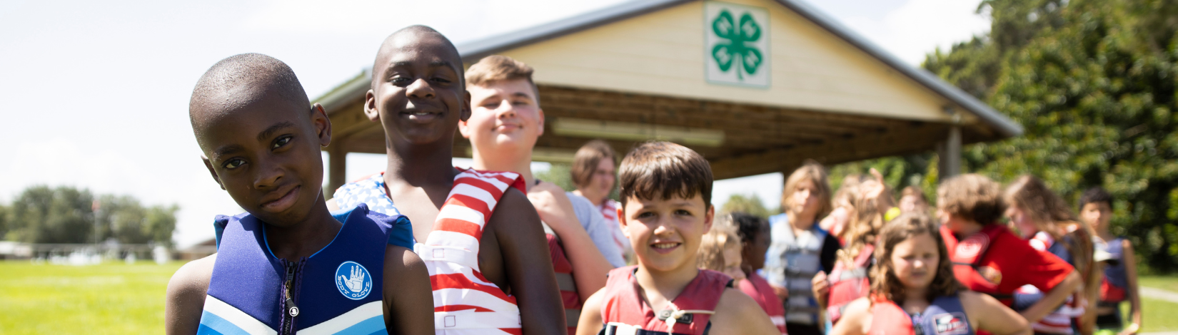 Banner image of youth lining up to go kayaking