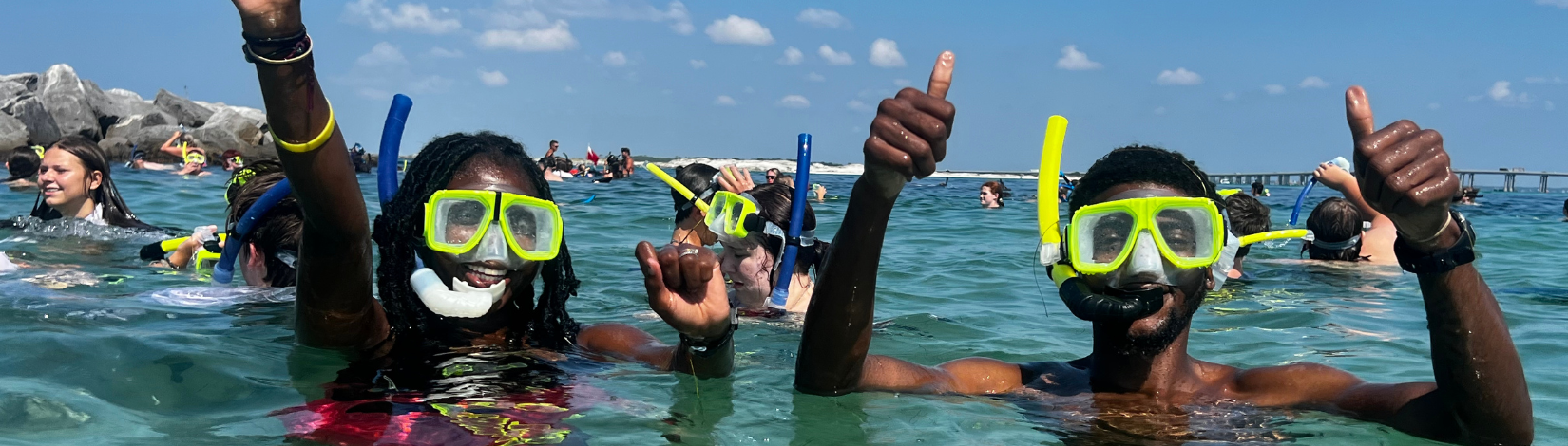 Banner image of youth scuba diving