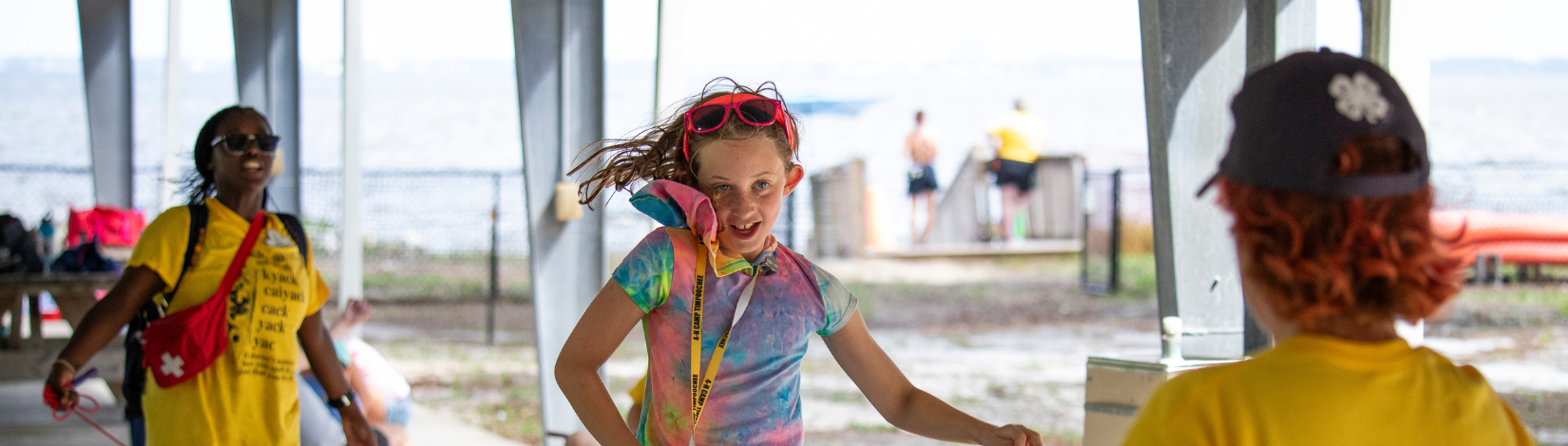 Banner image of youth teen counselors at camp